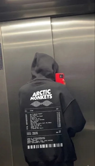 Customer wearing Arctic Monkeys hoodie