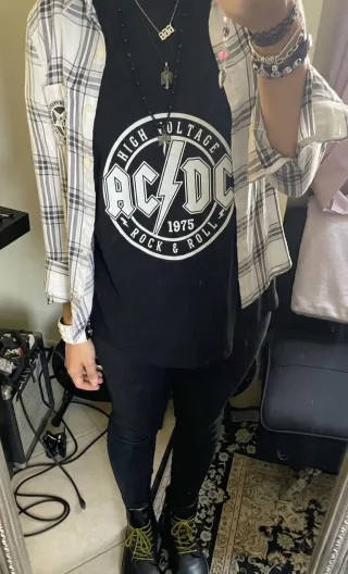 Customer wearing AC/DC t-shirt