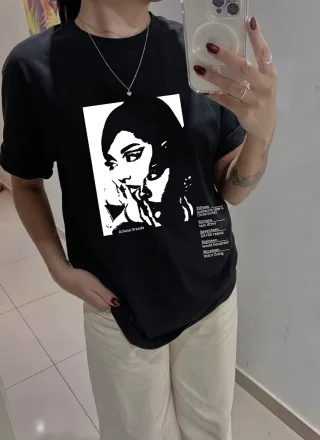 Customer wearing Ariana Grande t-shirt